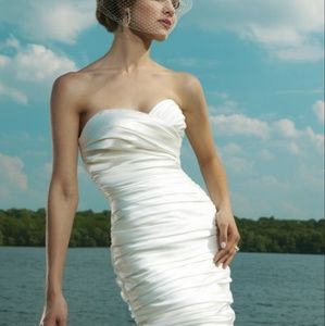 Brand New with tags never worn unhemmed gown/ dress off white satin sold as is